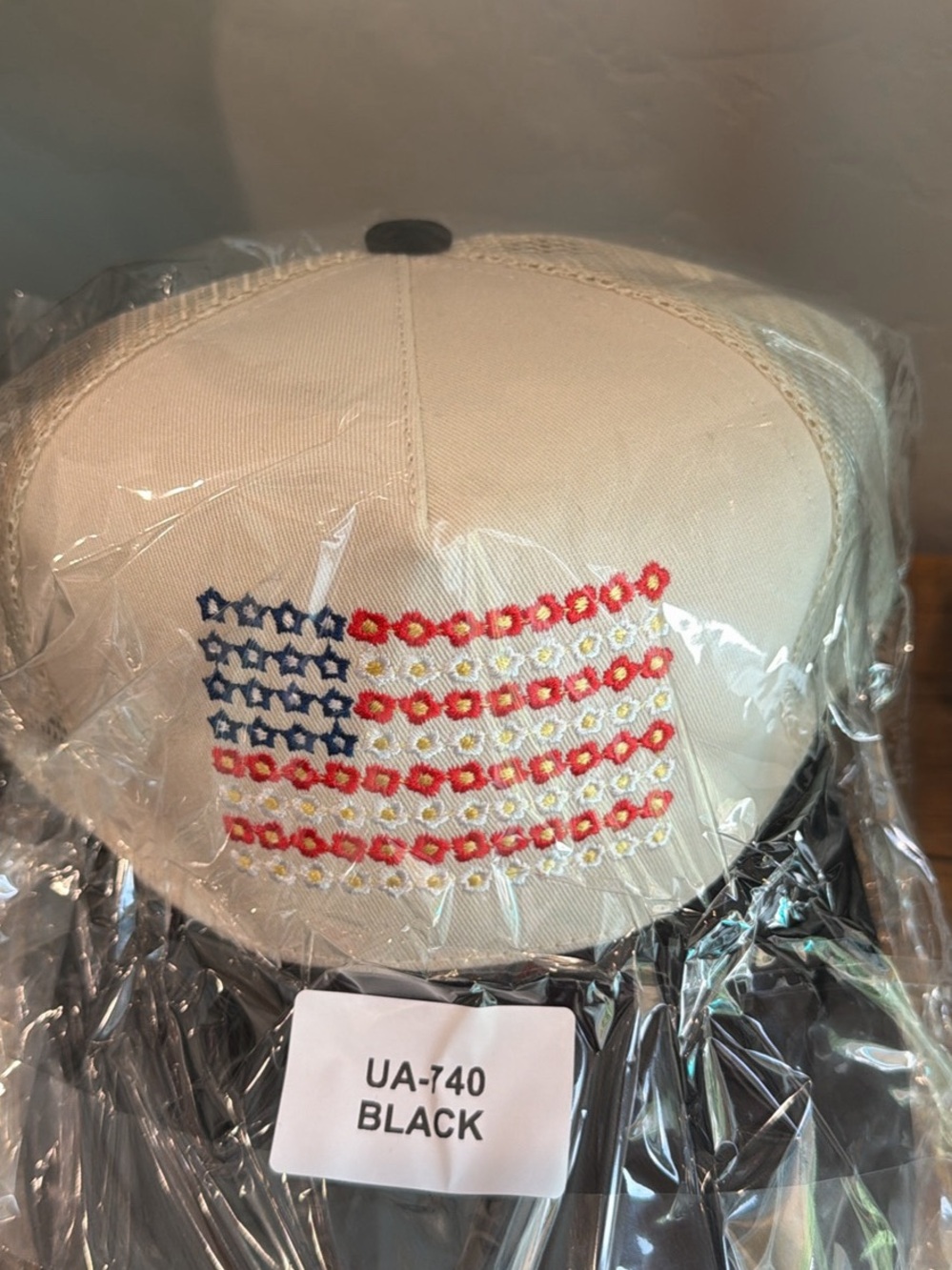 Zenana Outfitters Beige and Black Trucker Hat with Embroidered Floral Flag